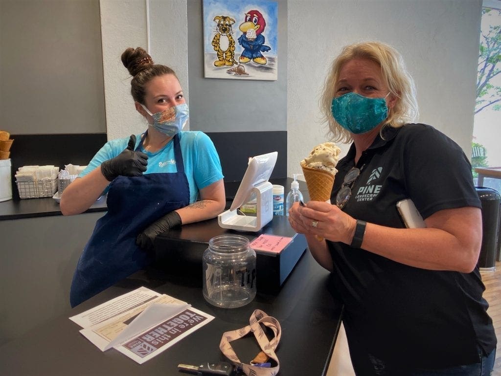 Local News Source press release of image of women eating icecream.